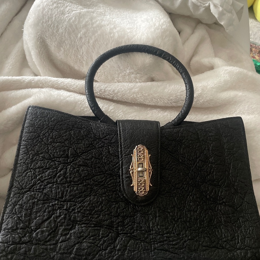 Genuine antique elephant hide purse